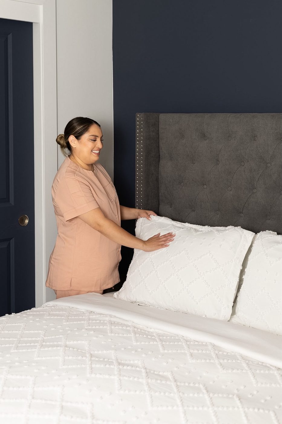 Making the bed with fresh linens